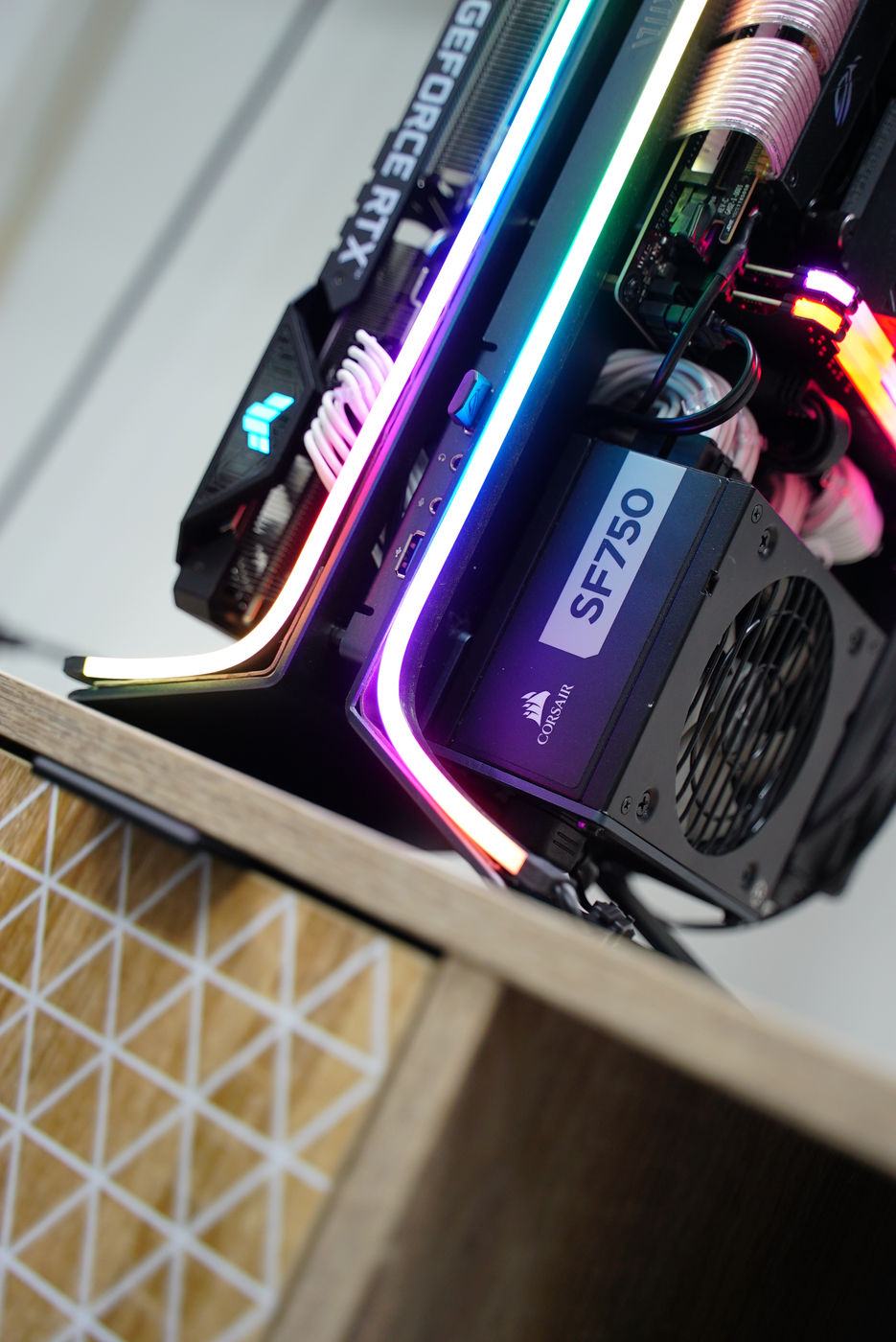 A custom PC standing in the workshop